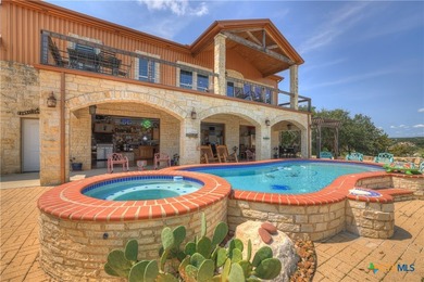 Set on more than six private acres overlooking Canyon Lake, this - photo 2
