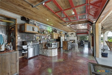 Set on more than six private acres overlooking Canyon Lake, this - photo 5