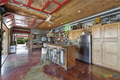 Set on more than six private acres overlooking Canyon Lake, this - photo 6