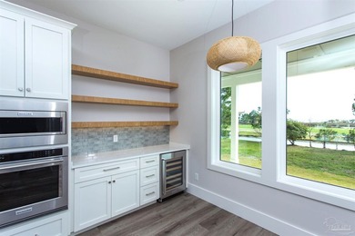 New Construction in a fantastic location in the Tiger Point Golf - photo 13