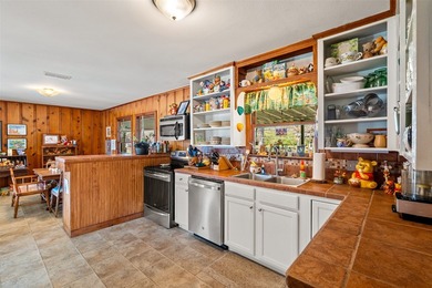 Sitting on 1.65 acres, inside the city limits, this incredibly - photo 15