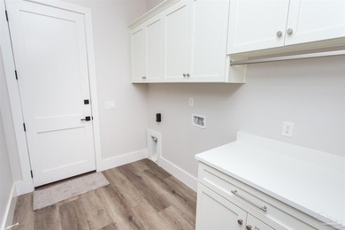 New Construction in a fantastic location in the Tiger Point Golf - photo 15