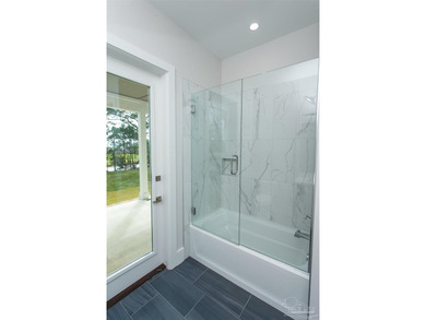 New Construction in a fantastic location in the Tiger Point Golf - photo 19