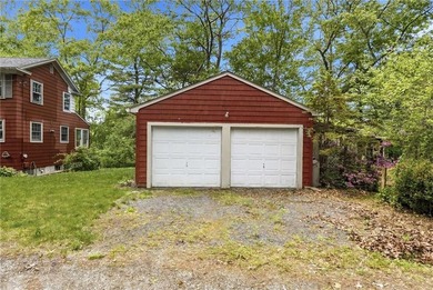 Set on nearly an acre in North Kingstown, this 3-bedroom, 1-bath - photo 3
