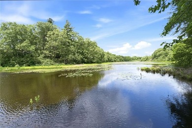 Set on nearly an acre in North Kingstown, this 3-bedroom, 1-bath - photo 5
