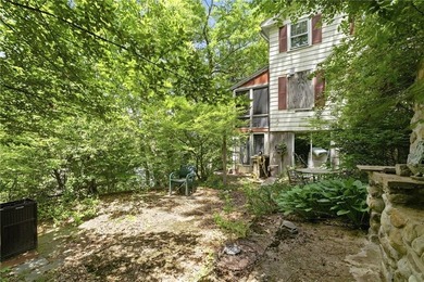 Set on nearly an acre in North Kingstown, this 3-bedroom, 1-bath - photo 7