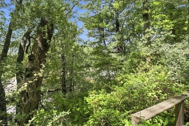 Set on nearly an acre in North Kingstown, this 3-bedroom, 1-bath - photo 8