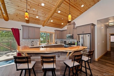 Experience the charm of mountain living in this beautifully - photo 12