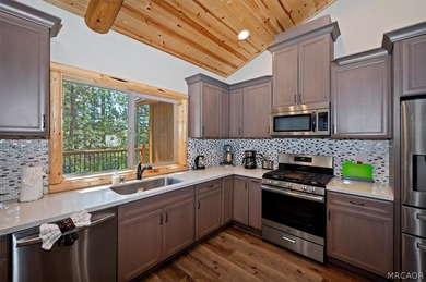 Experience the charm of mountain living in this beautifully - photo 15
