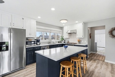 This spacious ranch home offers over 3,000 square feet of - photo 5