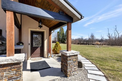 This unique 15 acre earth home situated just south of the city