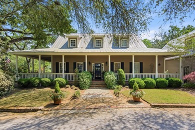 Located beneath breathtaking live oaks in the heart of the - photo 1