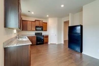 Discover this beautifully maintained four-bedroom, 2.5-bathroom - photo 8
