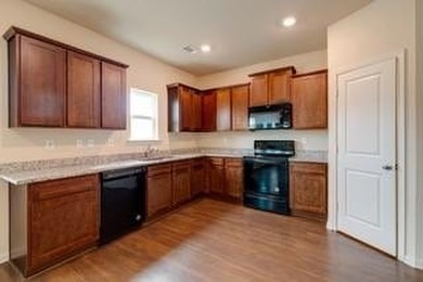 Discover this beautifully maintained four-bedroom, 2.5-bathroom - photo 9
