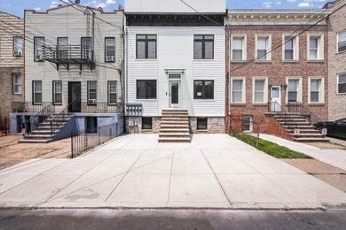 Exceptional condominium with a private fenced backyard and - photo 1