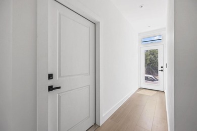 Exceptional condominium with a private fenced backyard and - photo 3