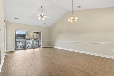 Enjoy the tranquil views of the pond and shimmering community - photo 6