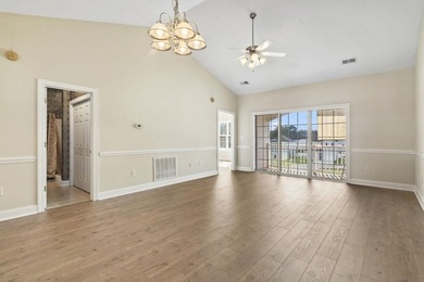 Enjoy the tranquil views of the pond and shimmering community - photo 7