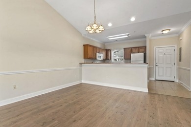 Enjoy the tranquil views of the pond and shimmering community - photo 10