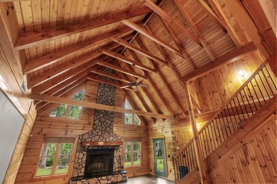 Step inside and the drama begins immediately. Soaring ceilings - photo 8