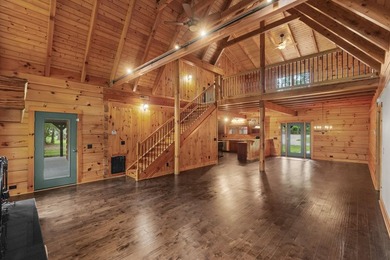 Step inside and the drama begins immediately. Soaring ceilings - photo 9