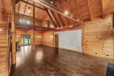 Step inside and the drama begins immediately. Soaring ceilings - photo 10