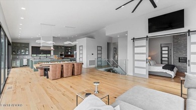 Welcome to 428 River Bend Drive, a stunning home perched on a - photo 10