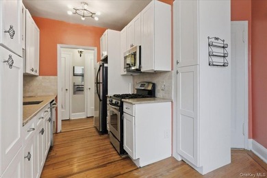 Classic Pre-War Charm Meets Modern Living at 3875 Waldo Avenue - photo 10