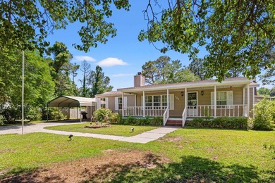 Welcome to this charming 3-bedroom, 2-bath home located in the - photo 2