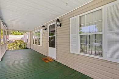 Welcome to this charming 3-bedroom, 2-bath home located in the - photo 3