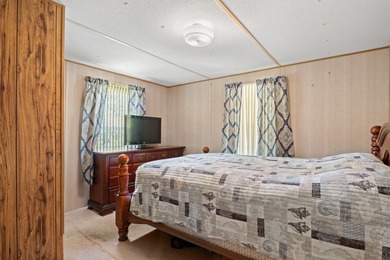 Welcome to this charming 3-bedroom, 2-bath home located in the - photo 4