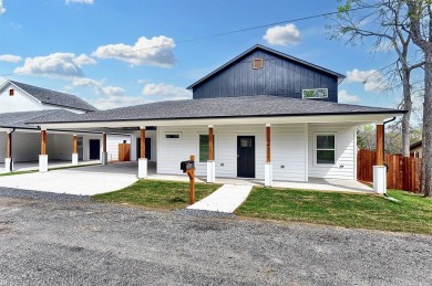 Lake Home For Sale in Pottsboro, Texas