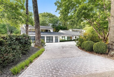 This contemporary Hamptons escape on 2 acres in the heart of - photo 1