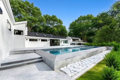 This contemporary Hamptons escape on 2 acres in the heart of - photo 3