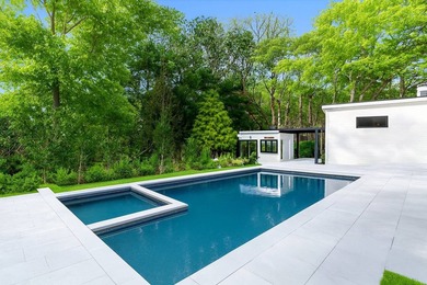 This contemporary Hamptons escape on 2 acres in the heart of - photo 5