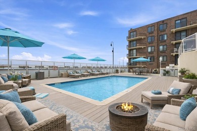 Enjoy breathtaking beachfront living in this beautiful - photo 19