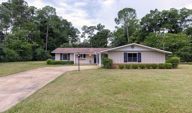 Welcome to 1702 Culbreth Street, a beautifully updated 4-bedroom - photo 2