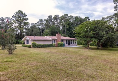 Welcome to 1702 Culbreth Street, a beautifully updated 4-bedroom - photo 3