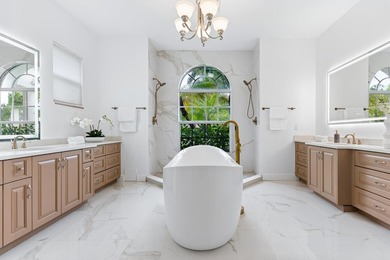 Over $300,000 in renovations. Custom single-story estate in an - photo 1