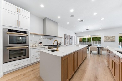 Over $300,000 in renovations. Custom single-story estate in an - photo 2