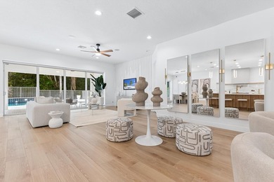 Over $300,000 in renovations. Custom single-story estate in an - photo 3