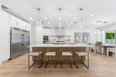 Over $300,000 in renovations. Custom single-story estate in an - photo 5