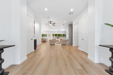 Over $300,000 in renovations. Custom single-story estate in an - photo 8