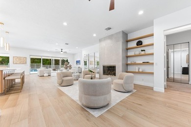 Over $300,000 in renovations. Custom single-story estate in an - photo 9