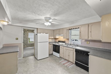 This two bedroom, one bathroom lakehouse is all about time well - photo 11