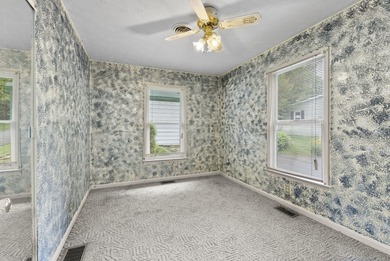 This two bedroom, one bathroom lakehouse is all about time well - photo 14