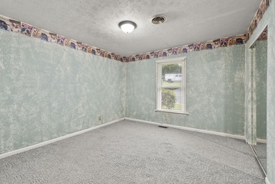 This two bedroom, one bathroom lakehouse is all about time well - photo 17