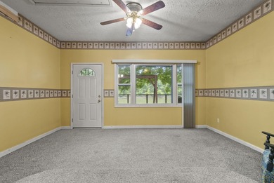 This two bedroom, one bathroom lakehouse is all about time well - photo 18