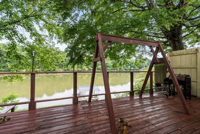 This two bedroom, one bathroom lakehouse is all about time well - photo 24
