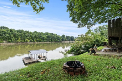 This two bedroom, one bathroom lakehouse is all about time well - photo 25